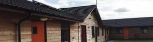PGL Liddington Timber Frame Accommodation with Metrotile Lightweight Roofing in Bond Charcoal with retrofit Photovoltaic System